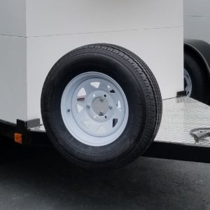 deck-mounted tire rack and spare tire